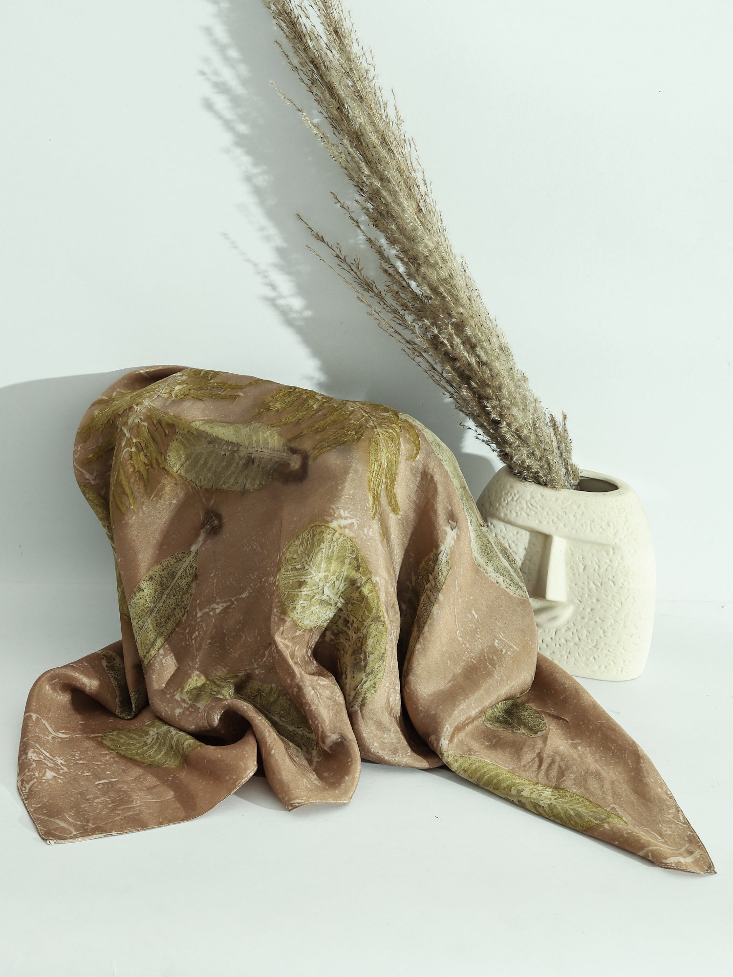 A brown square scarf