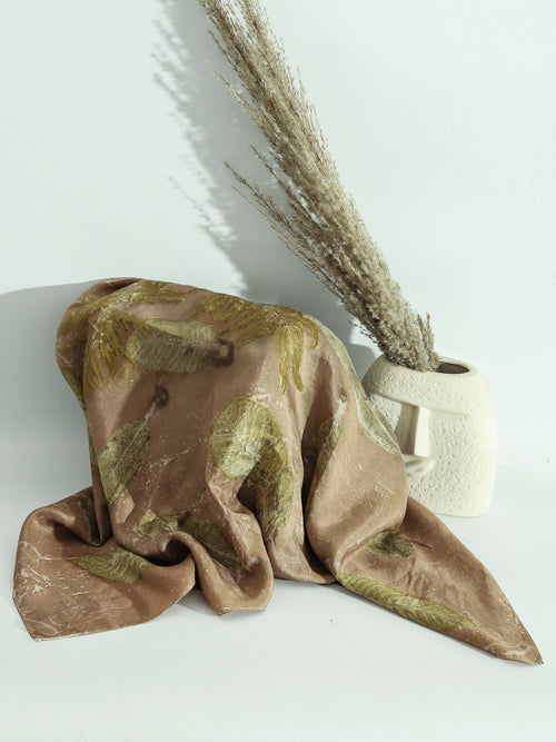 A brown square scarf