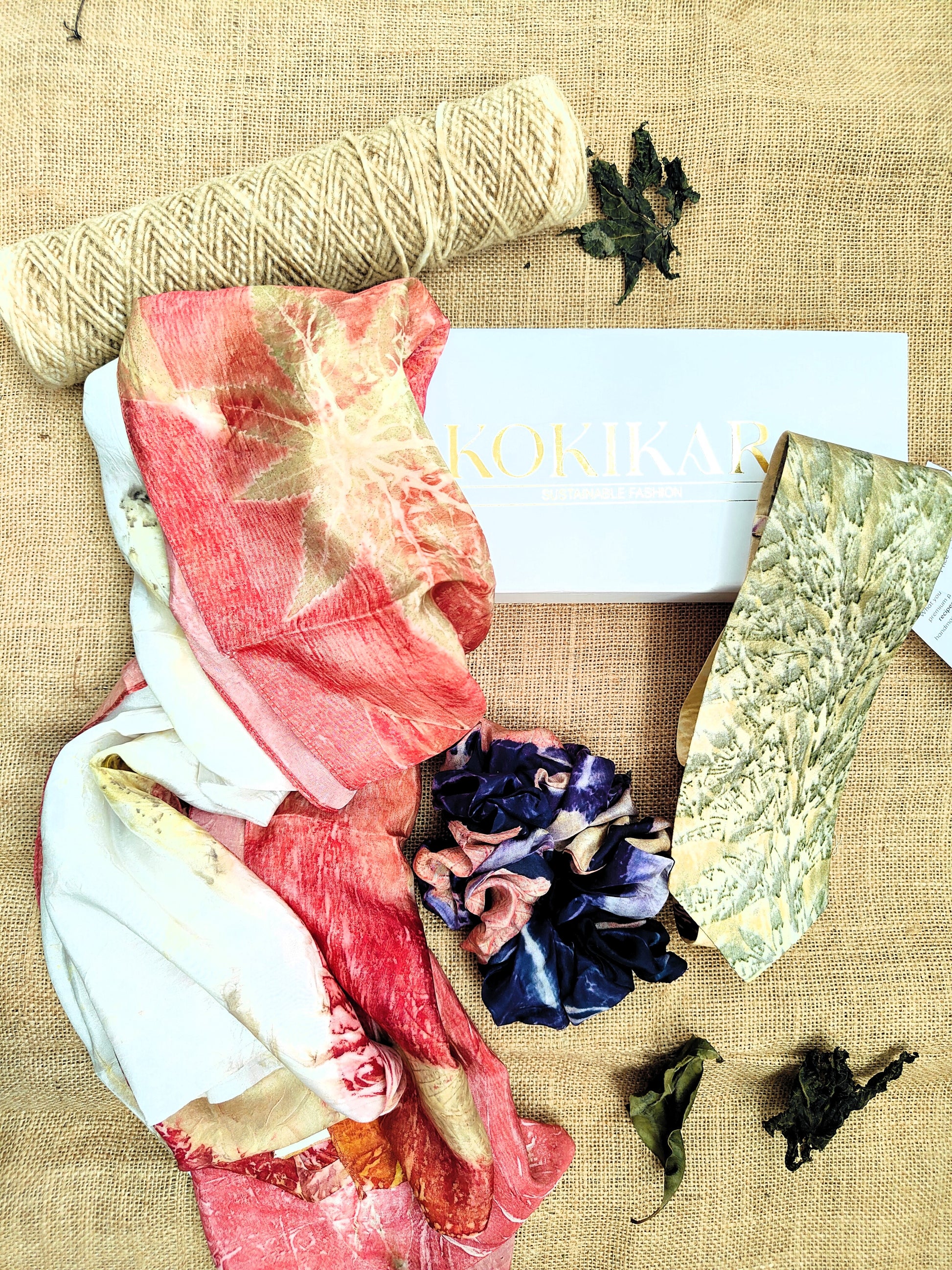 Colorful fabric with leave patterns on a textured surface