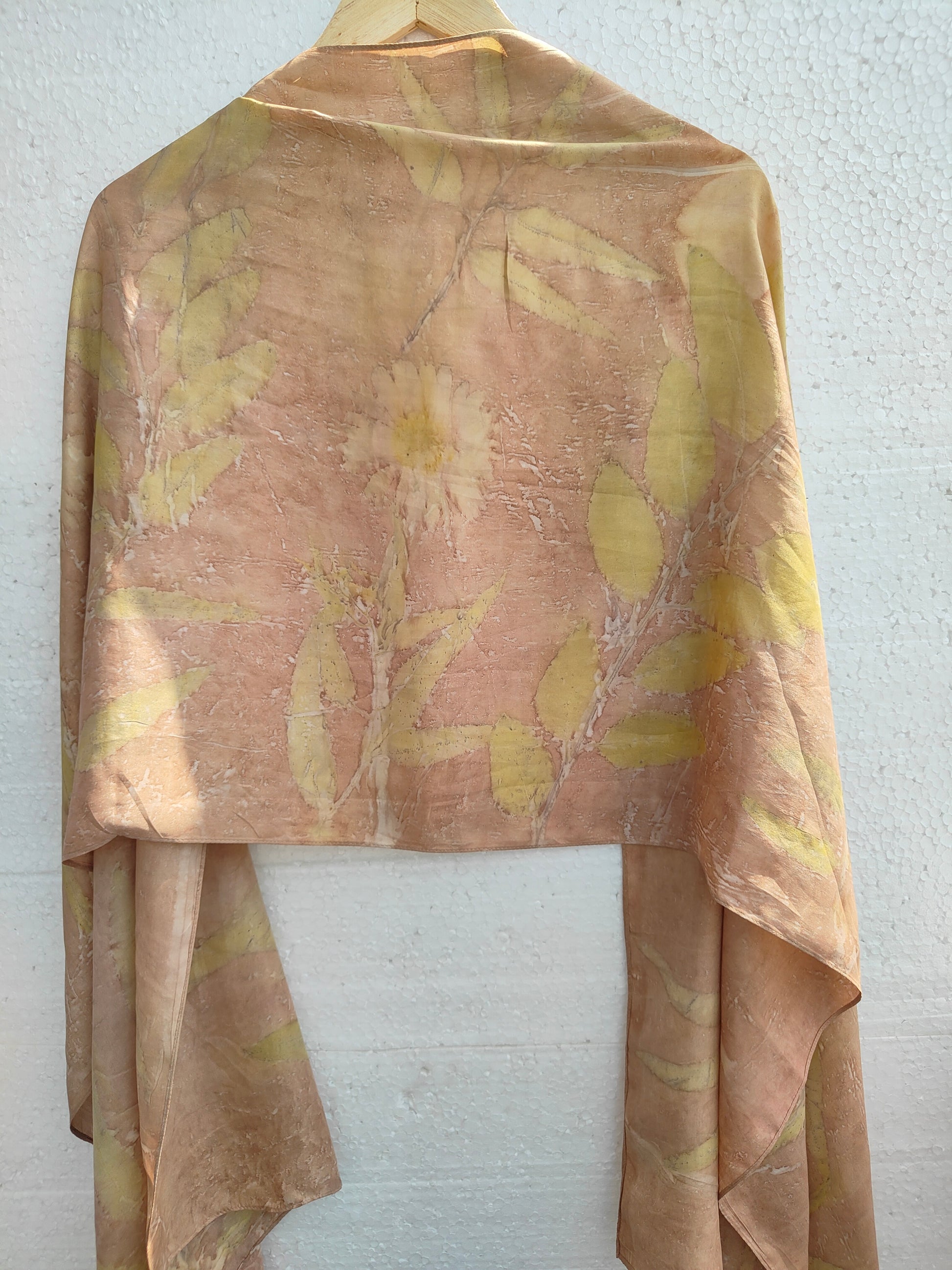 A ecoprinted beige scarf