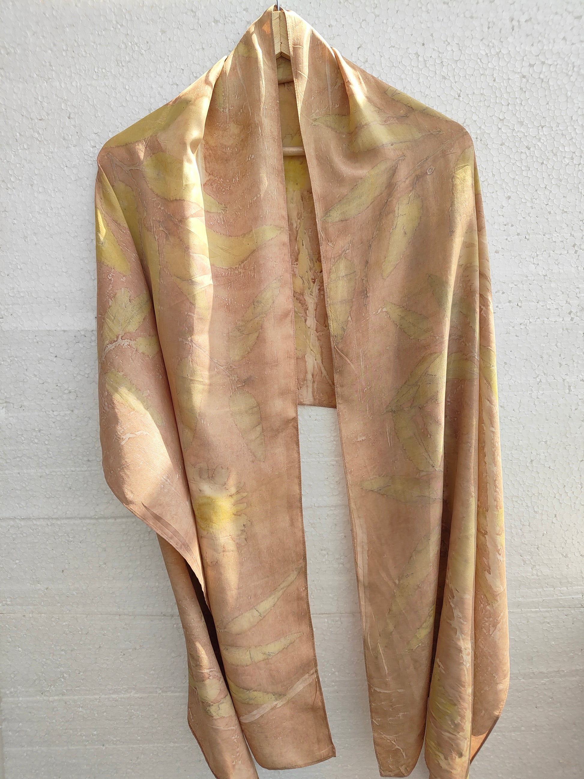 A beige silk scarf