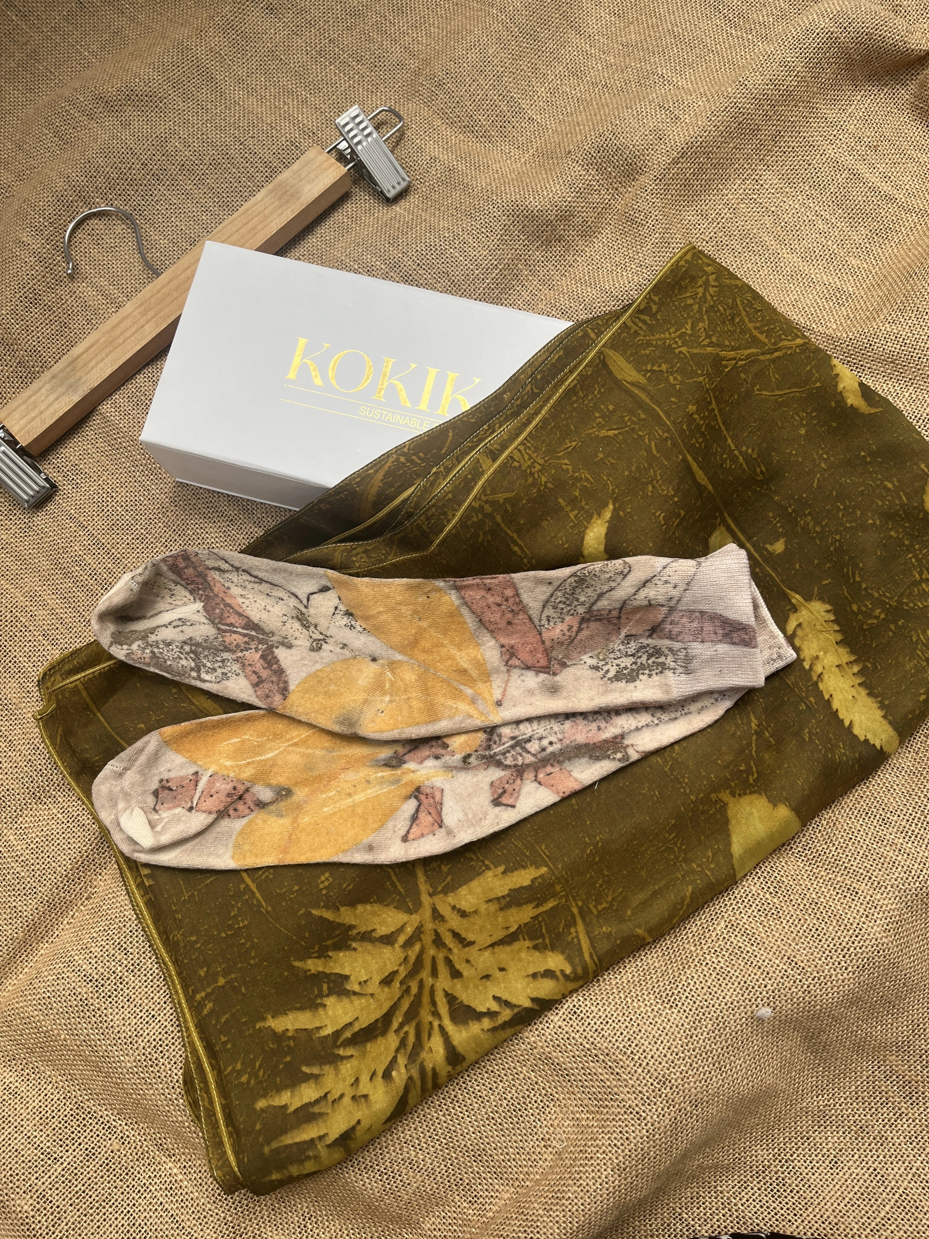 ecoprinted socks & scraf with gift box lying on the floor