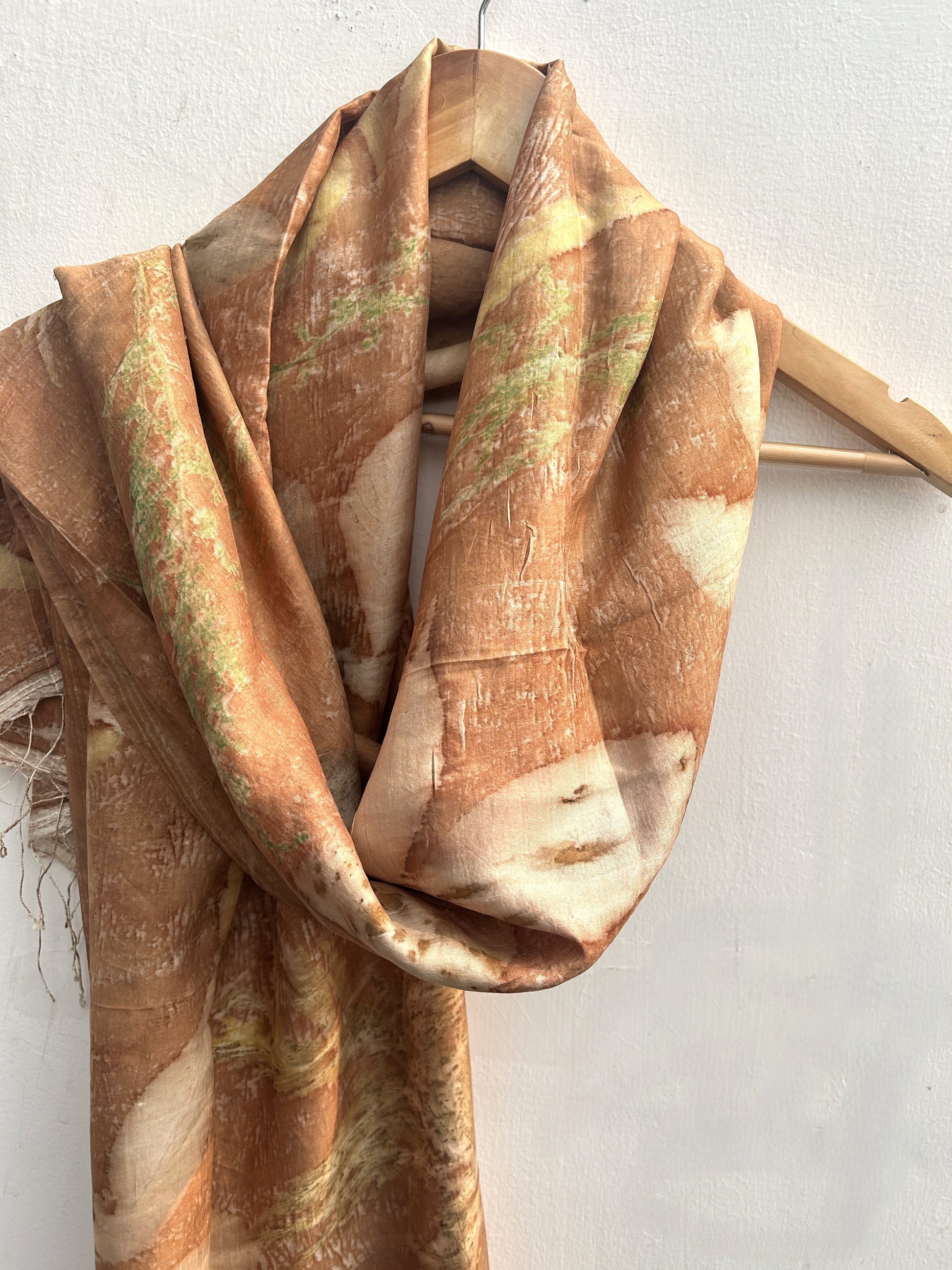 A beige silk scarf