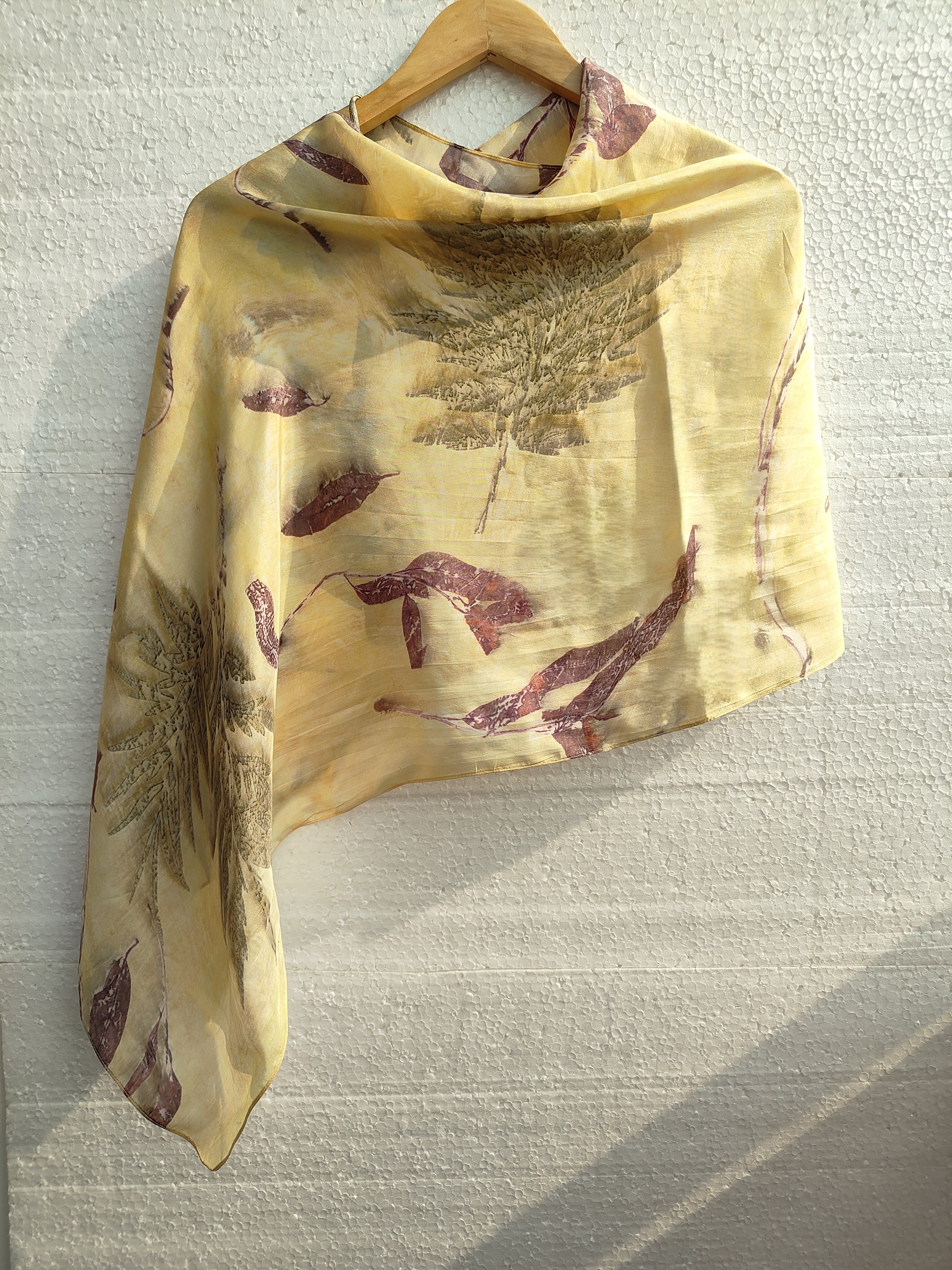 Shrubs and eucalyptus ecoprinted on scarf