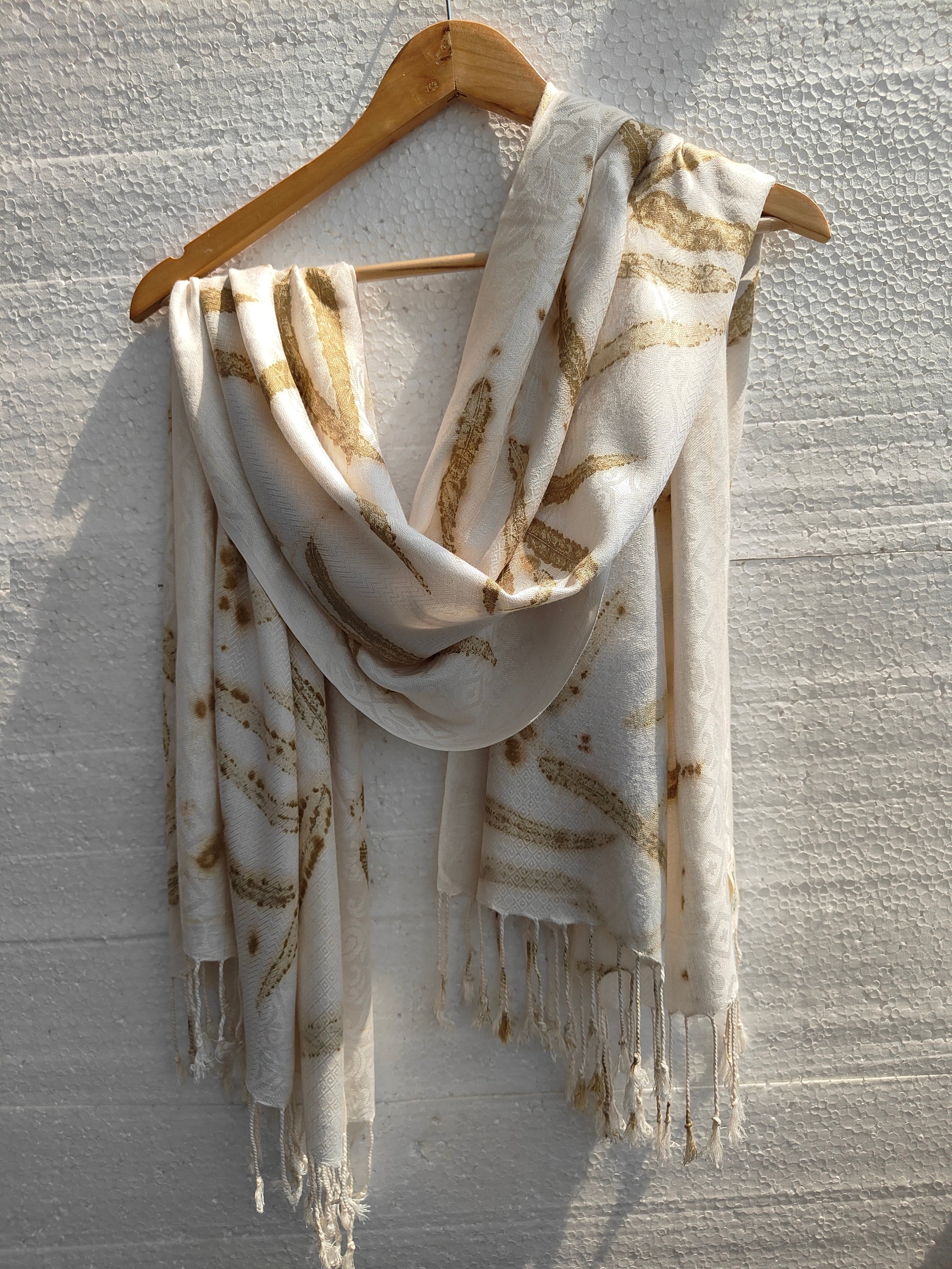 An ecoprinted viscose scarf