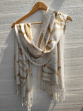 An ecoprinted viscose scarf