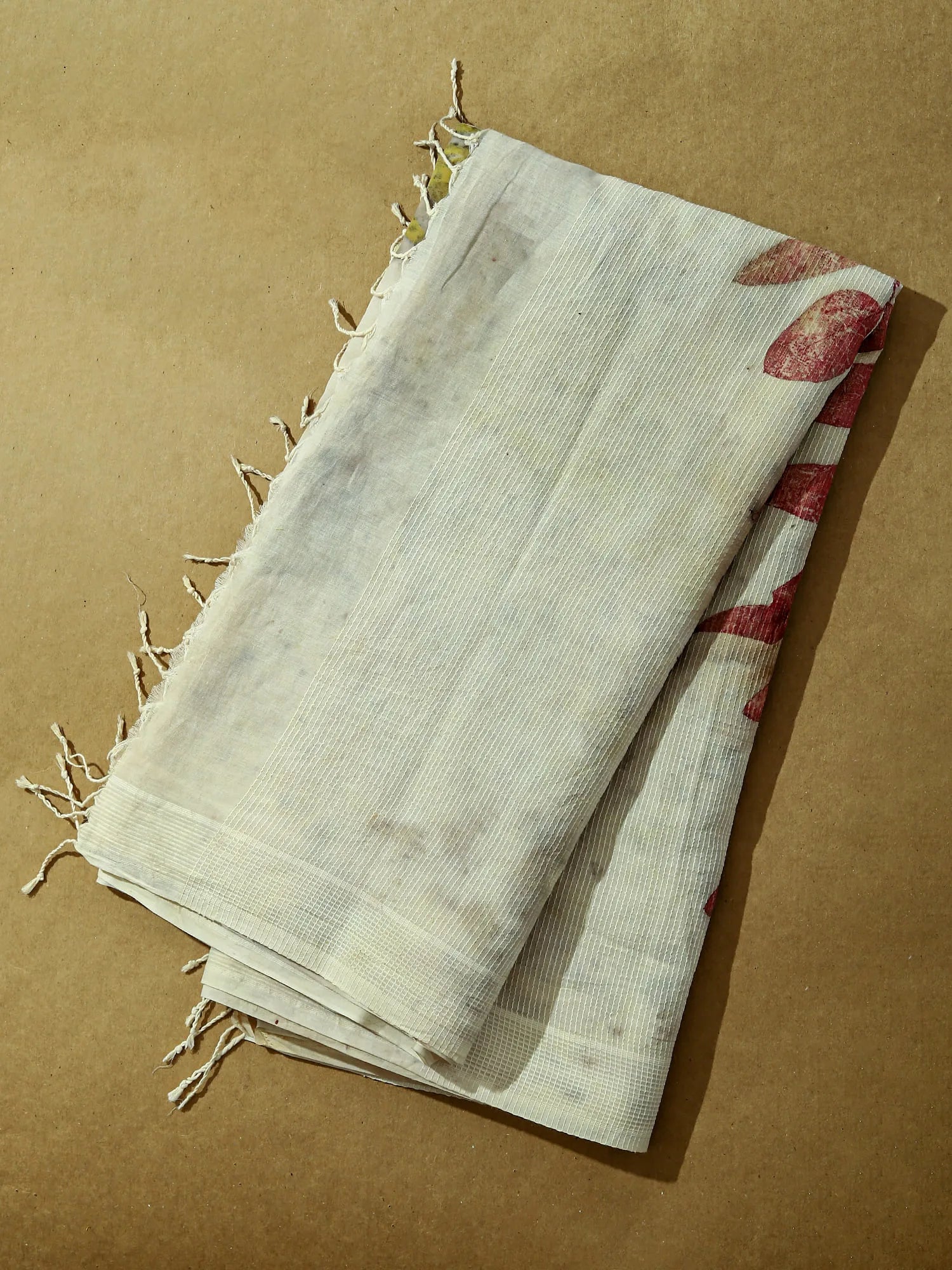 Eucalyptus Madder Ecoprinted  Cotton Saree on floor by kokikar