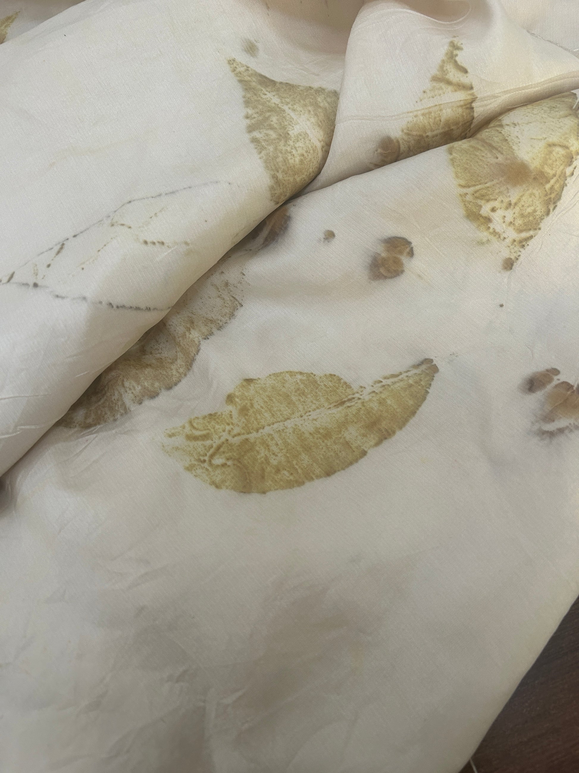 An ecoprinted white fabric