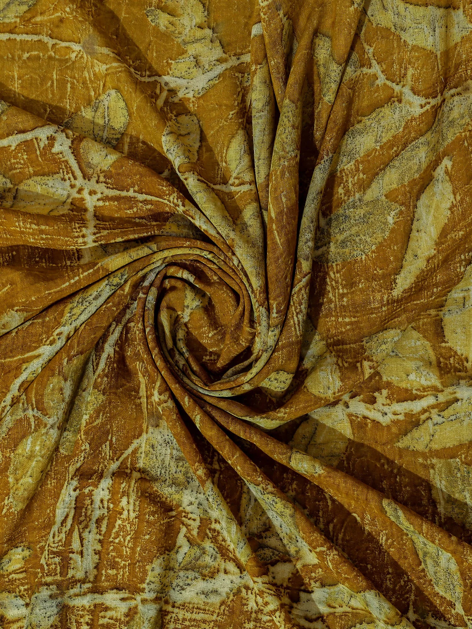 Round fold of Golden Ecoprinted Eri Silk Saree by kokikar 