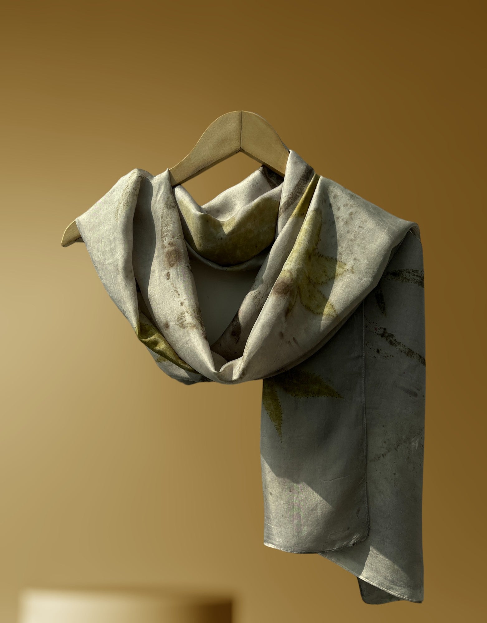 An ecoprinted silk scarf