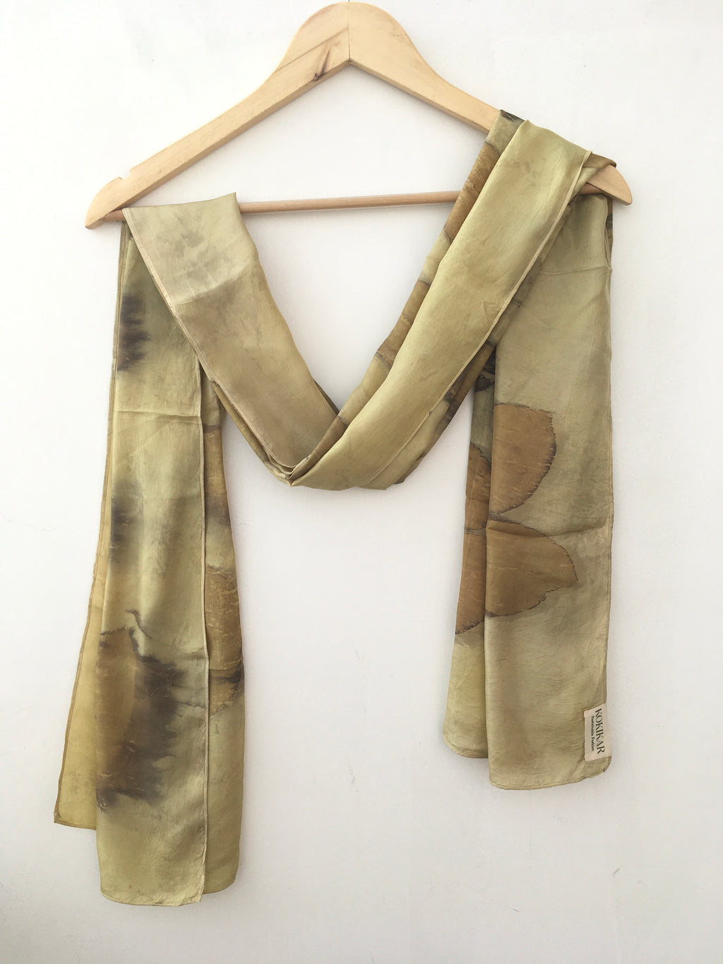 leaves patterned on a pure silk scarf white background