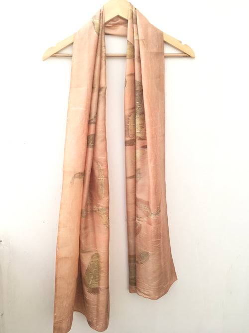 pure silk ecoprinted scarf on a white background
