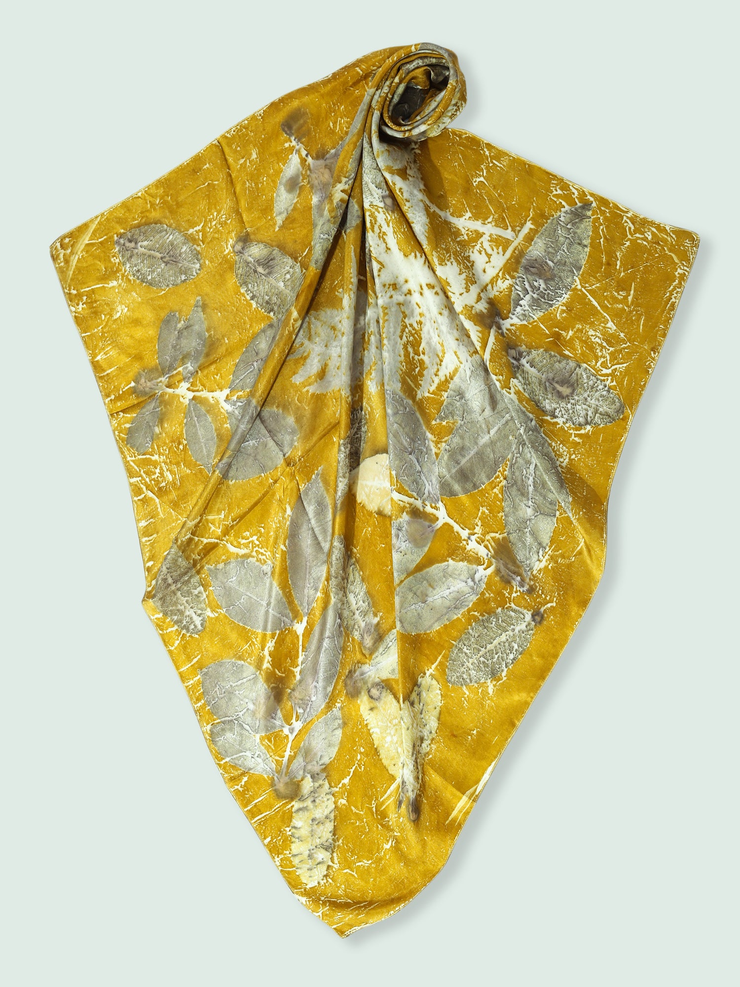 A folded silk scarf