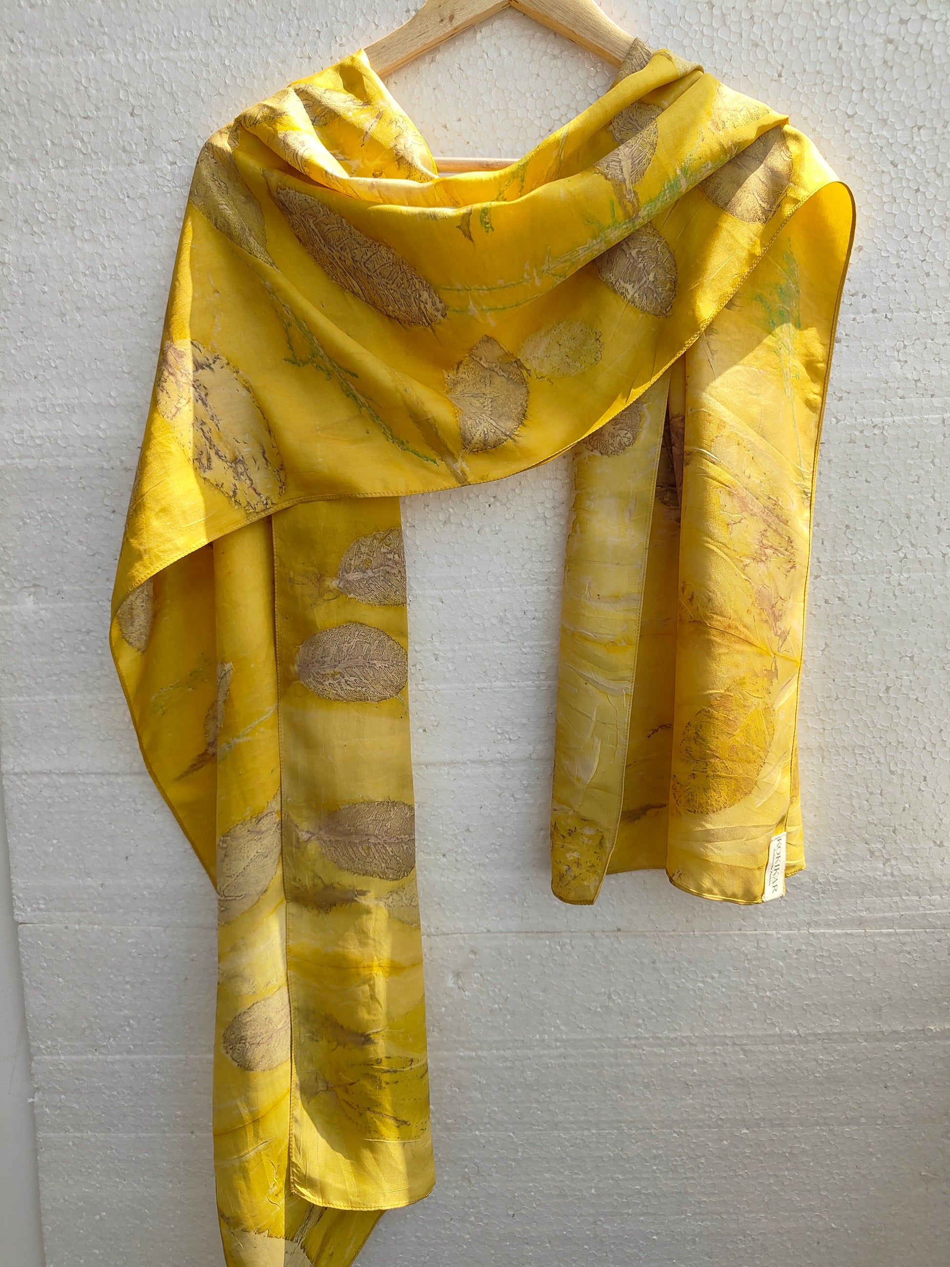 A hanging yellow scarf