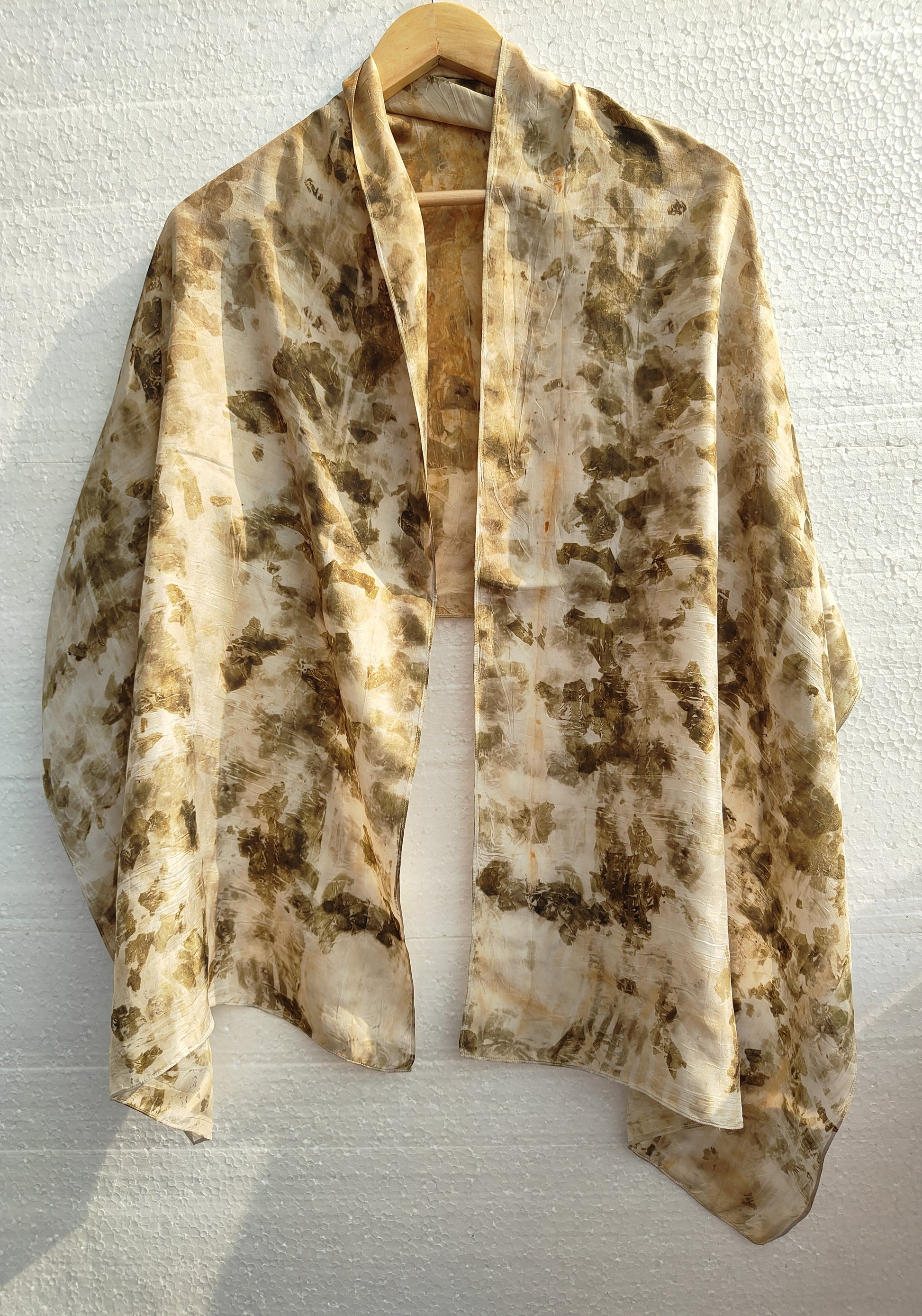 A hanging Ecoprinted Pure Silk scarf