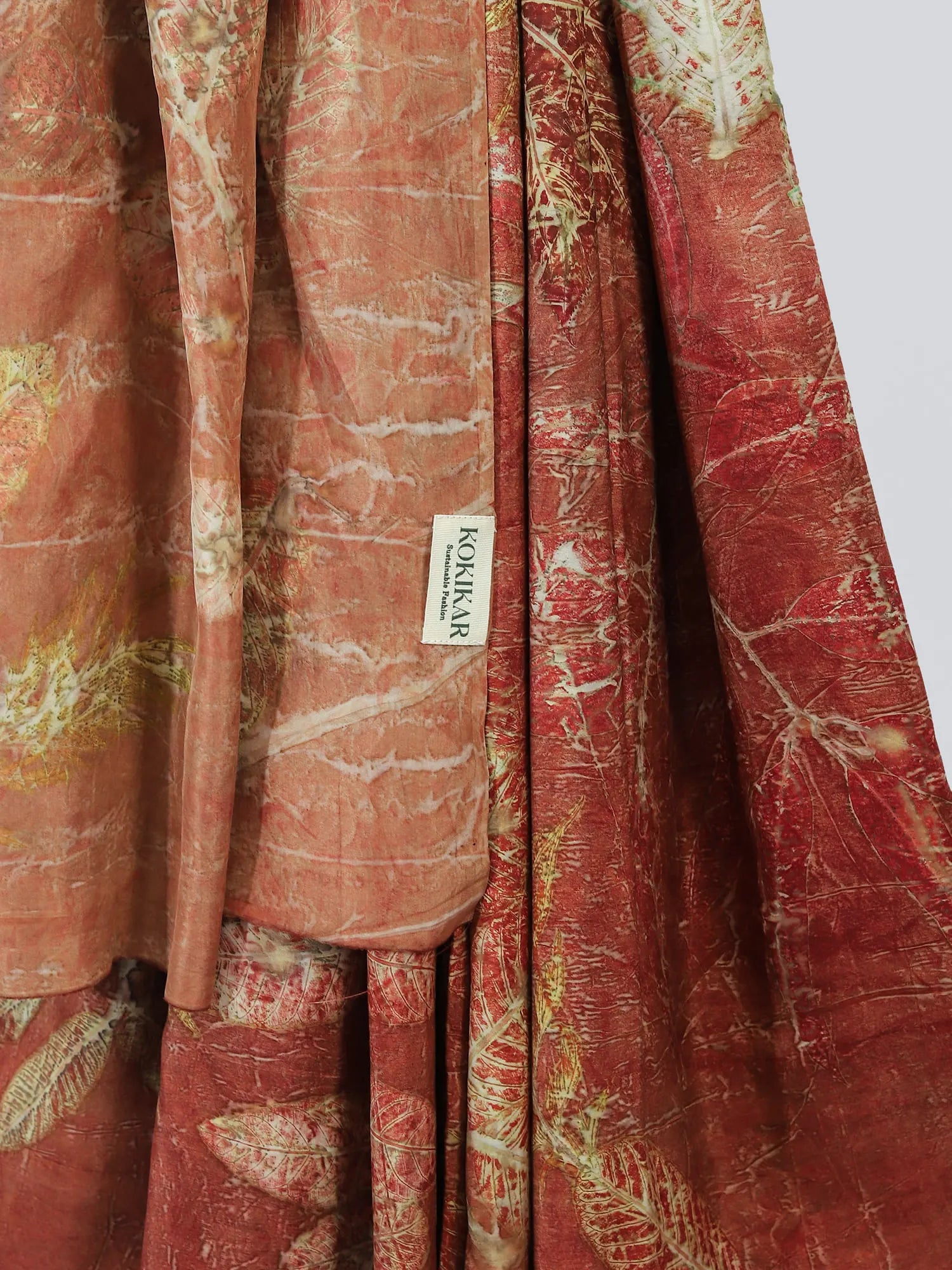 Close up of Maroon Ecoprinted Silk Saree by kokikar