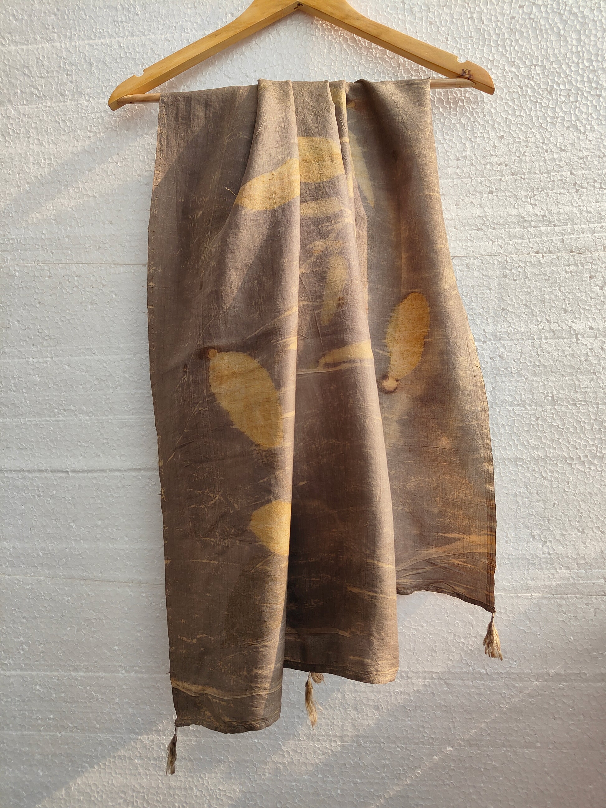 A mocha color ecoprinted silk scarf