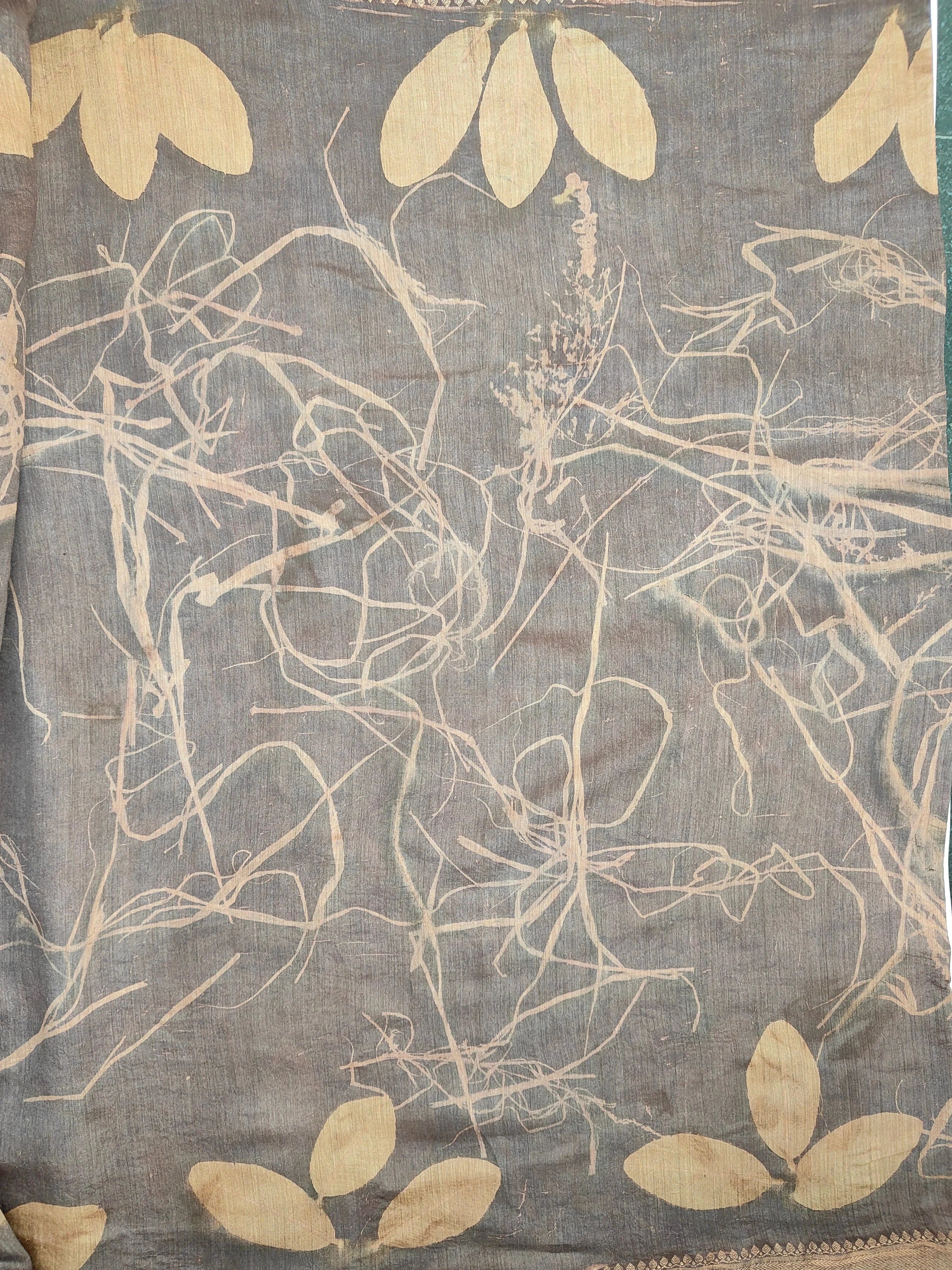Upper view of Muga Silk saree ecoprinted with jamun leaves kokikar