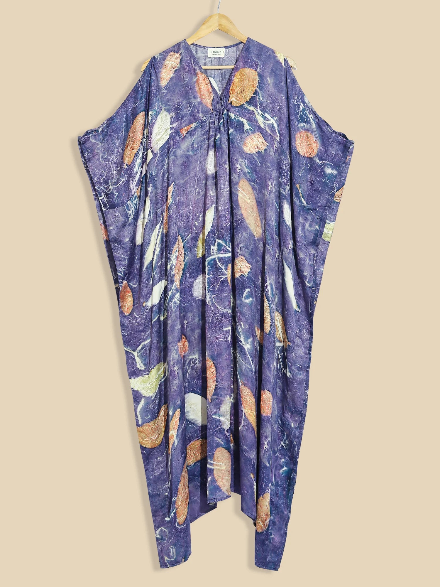 Blue ecoprinted kaftan on kokikar wall