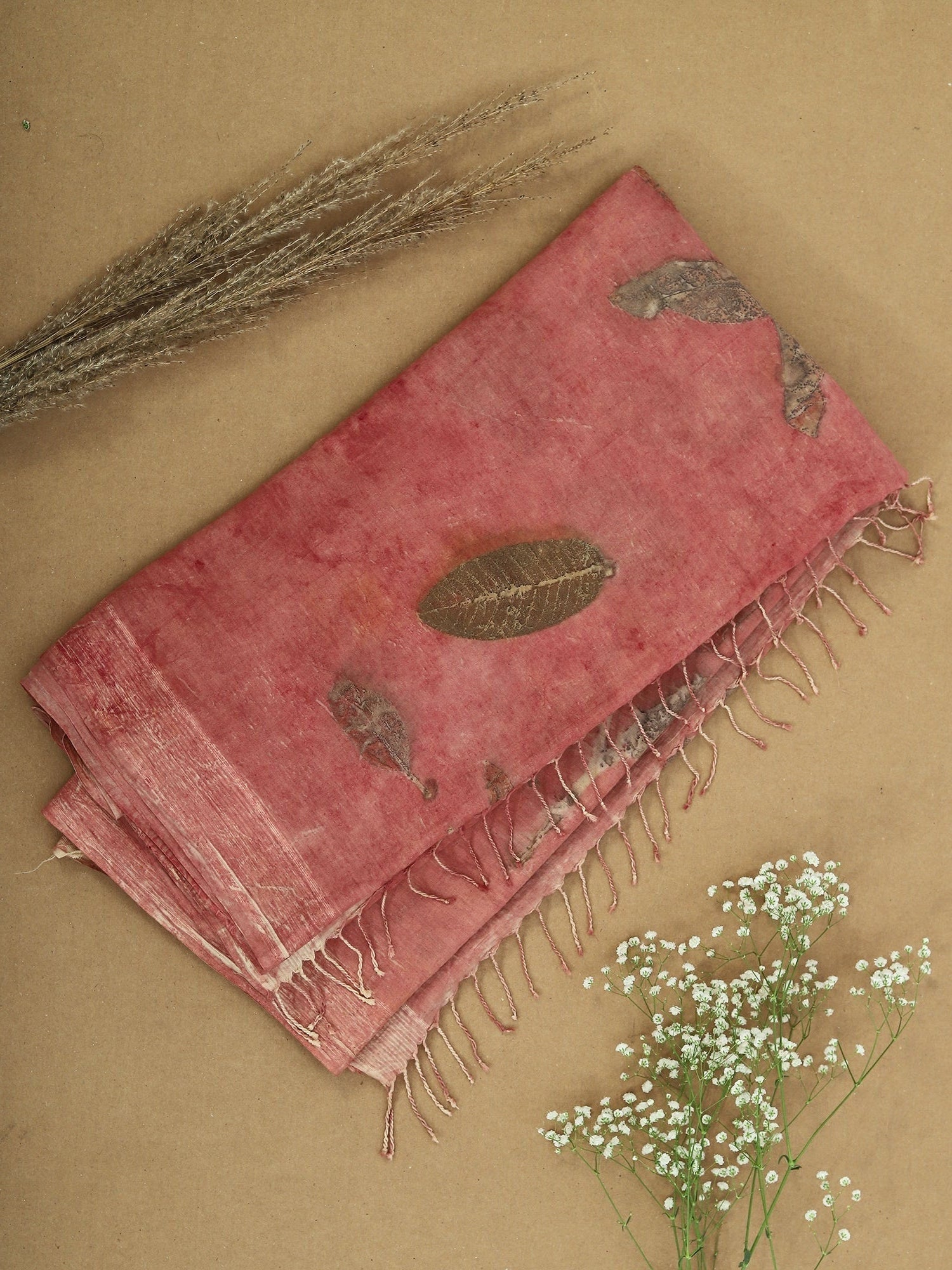 A Folded pink cotton saree