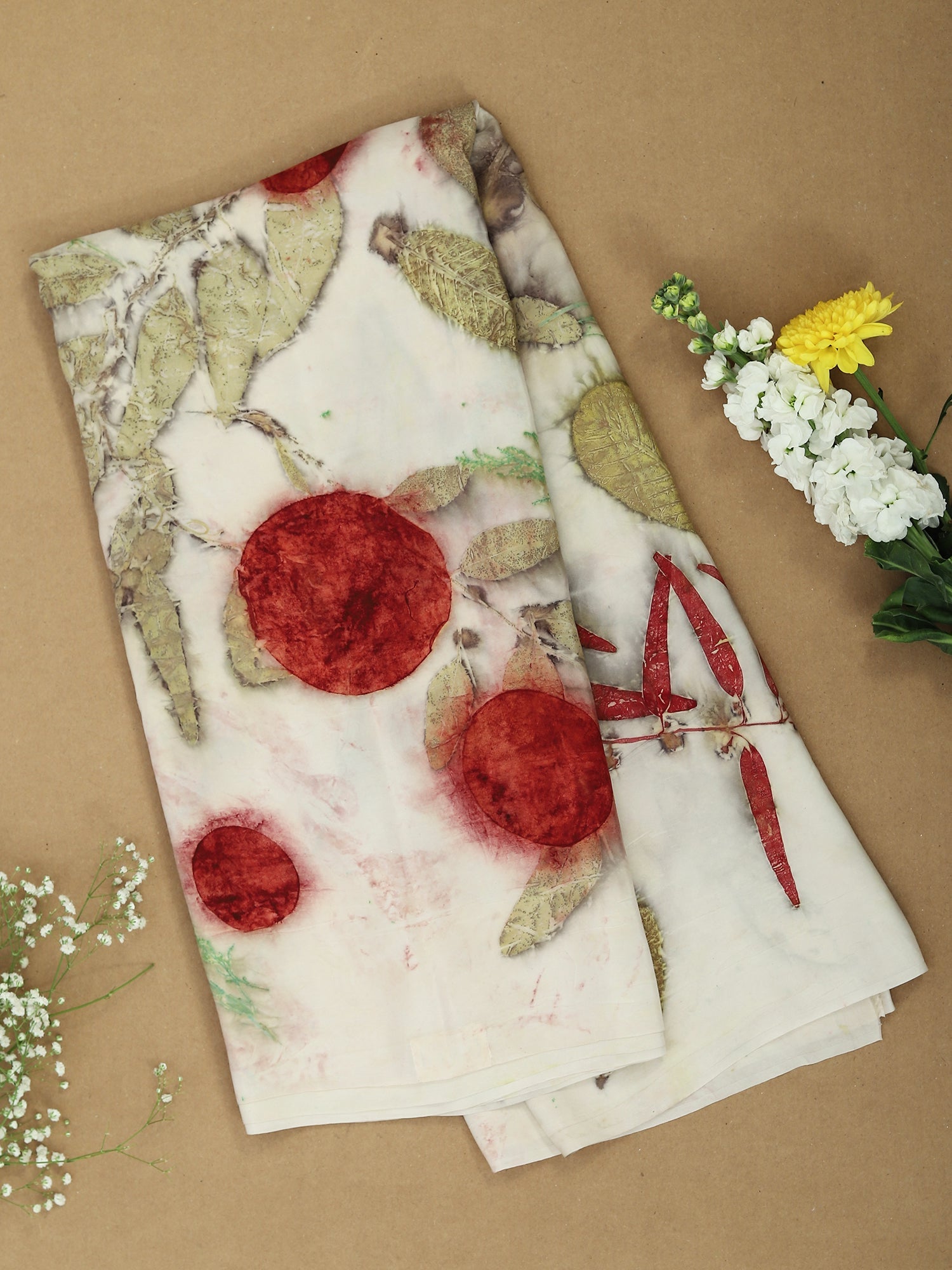 Folded white pure silk saree