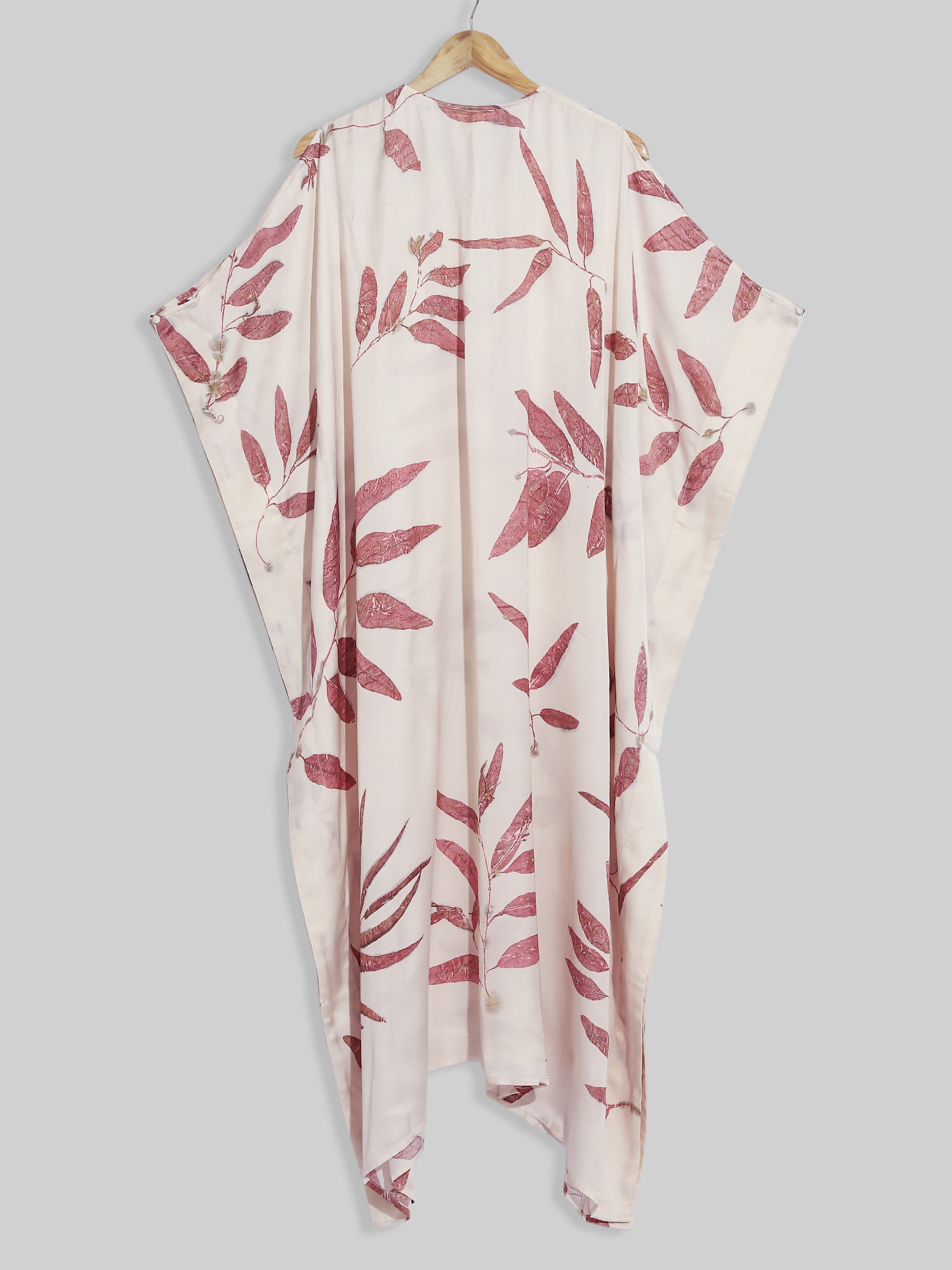 A kaftan Hanging on the wall.