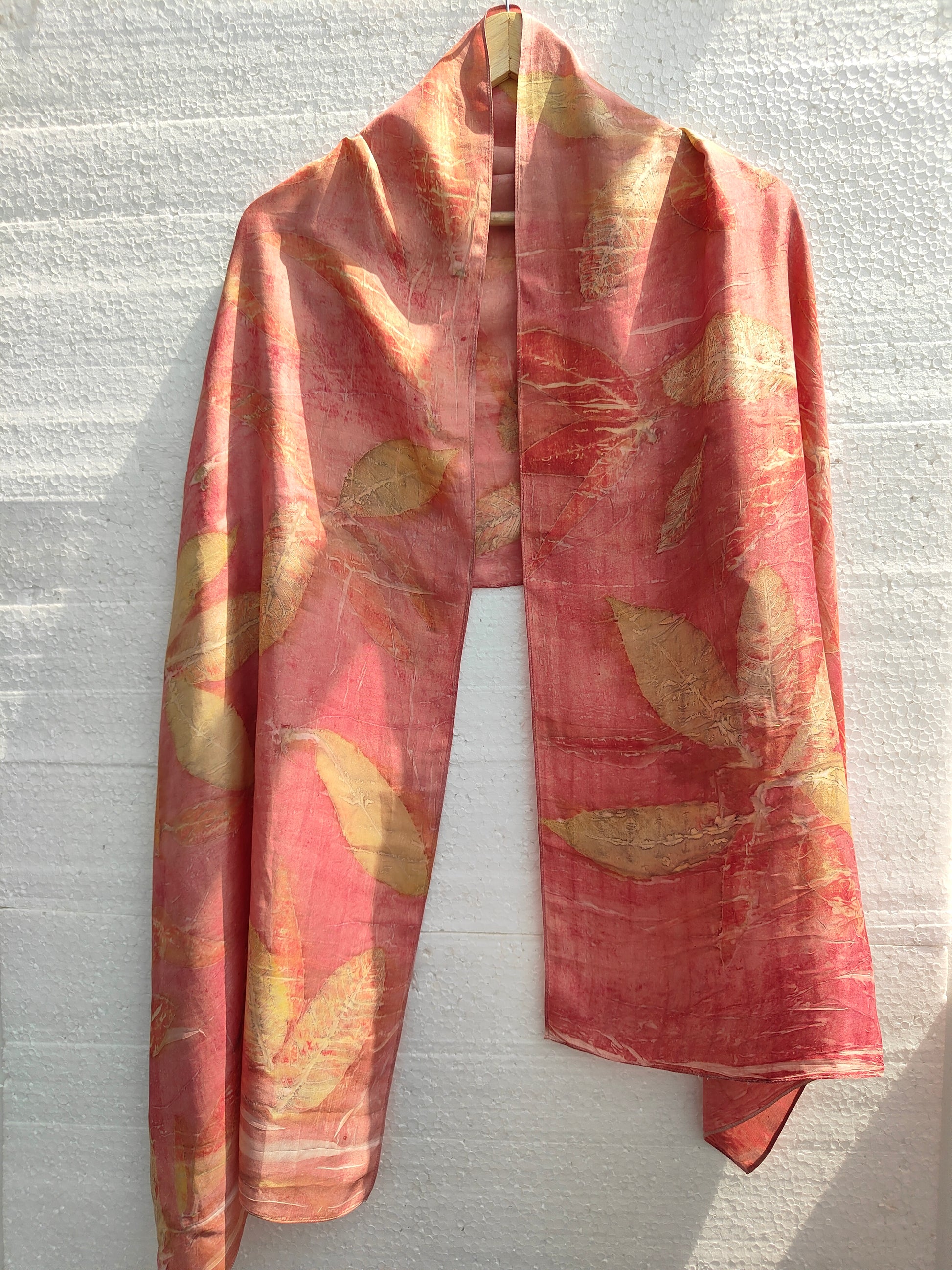 A pink silk scarf