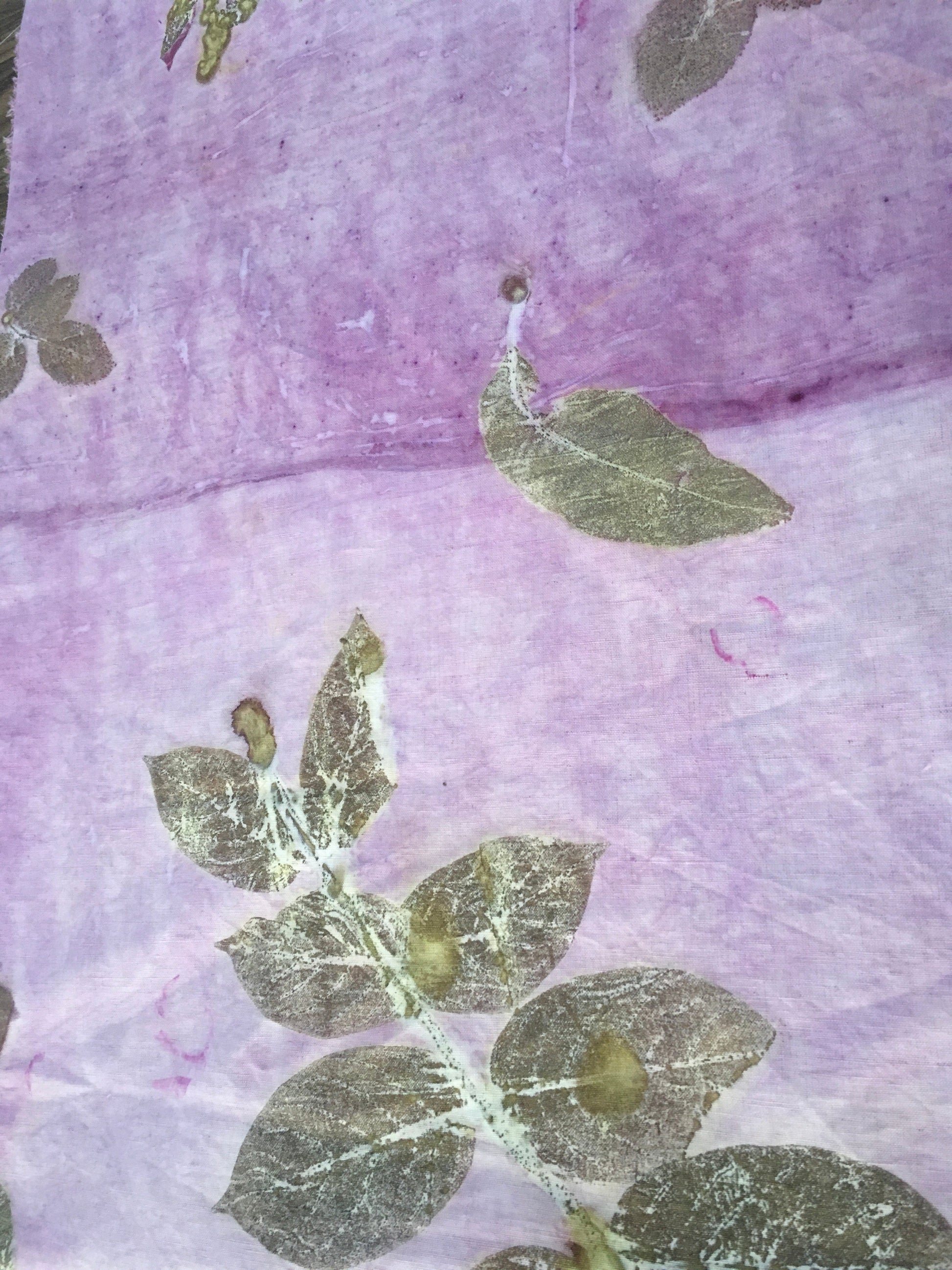 A linen fabric with ecoprinted jamun leaves