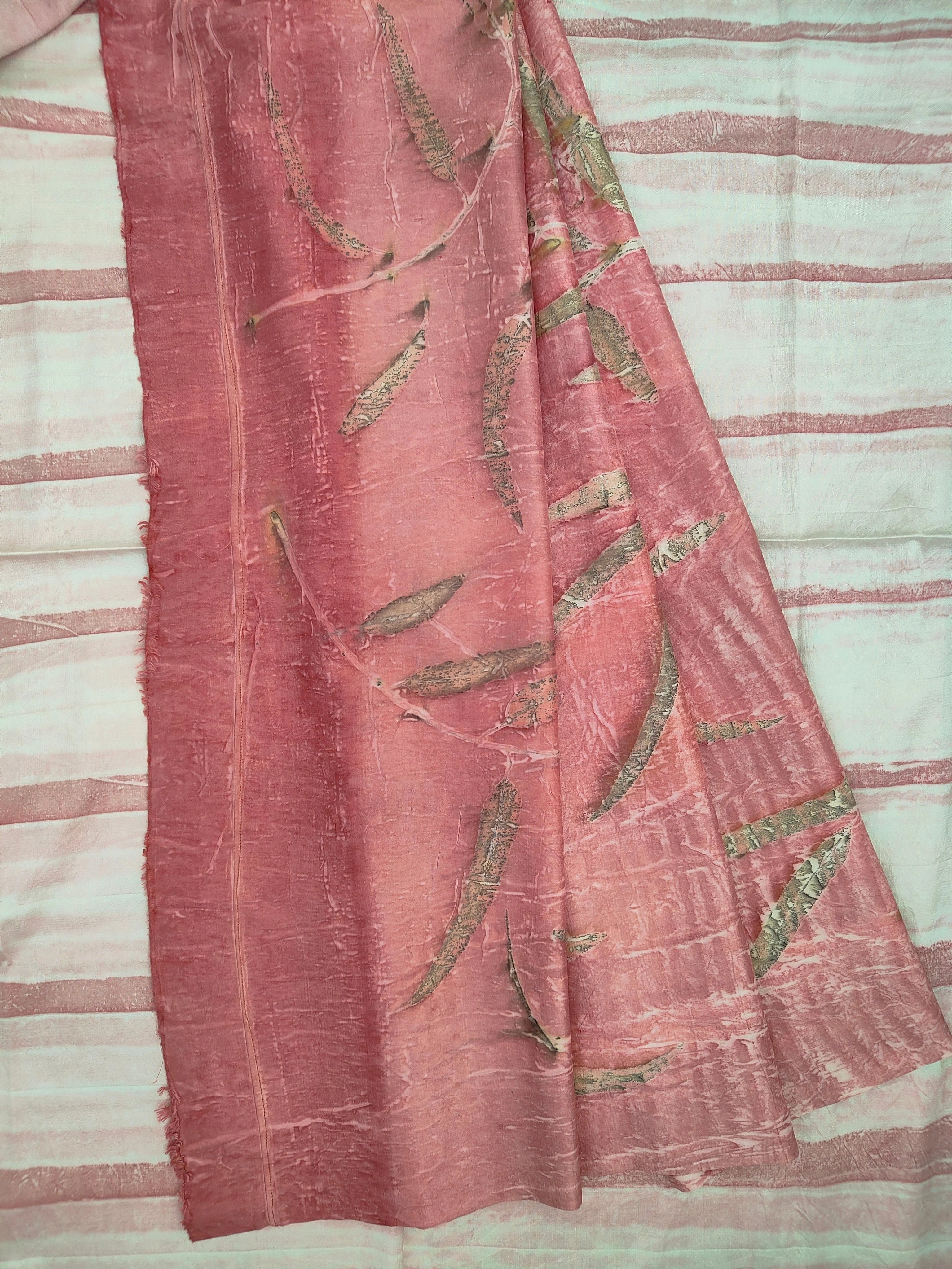 Ruby Radiance ecoprinted Pure Silk Saree folded on bed