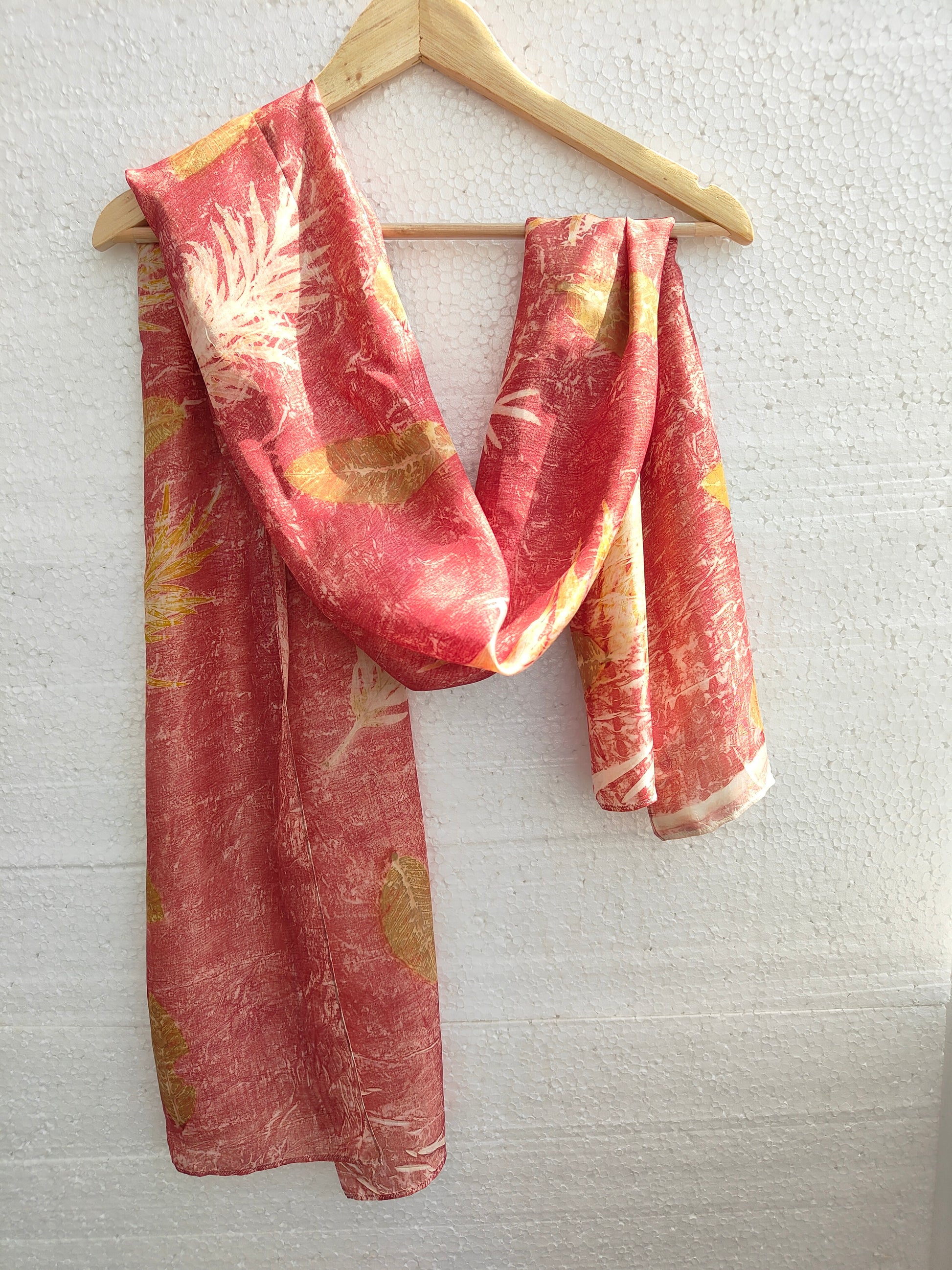 A hanging ecoprinted scarf
