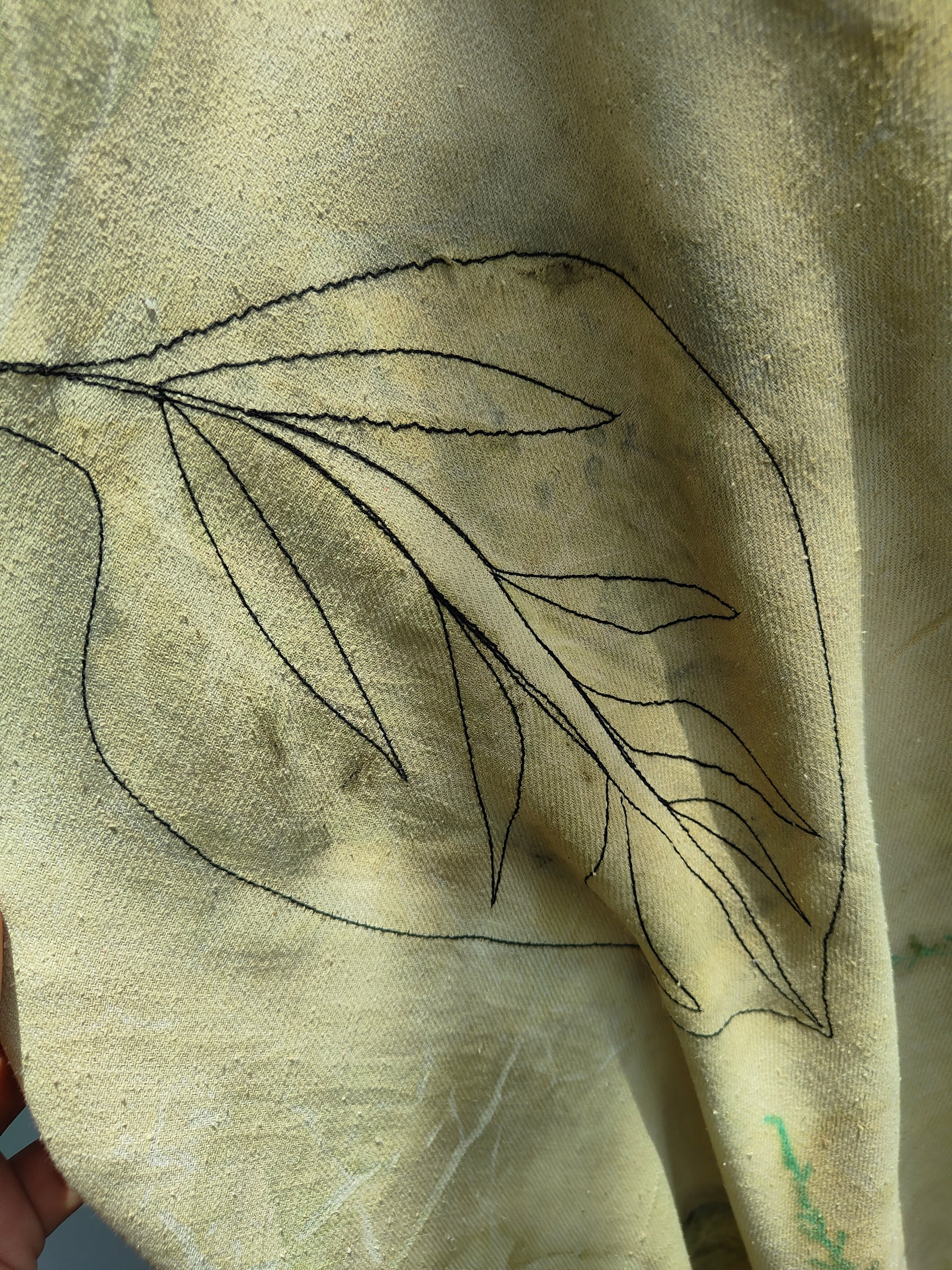An embroided leaf