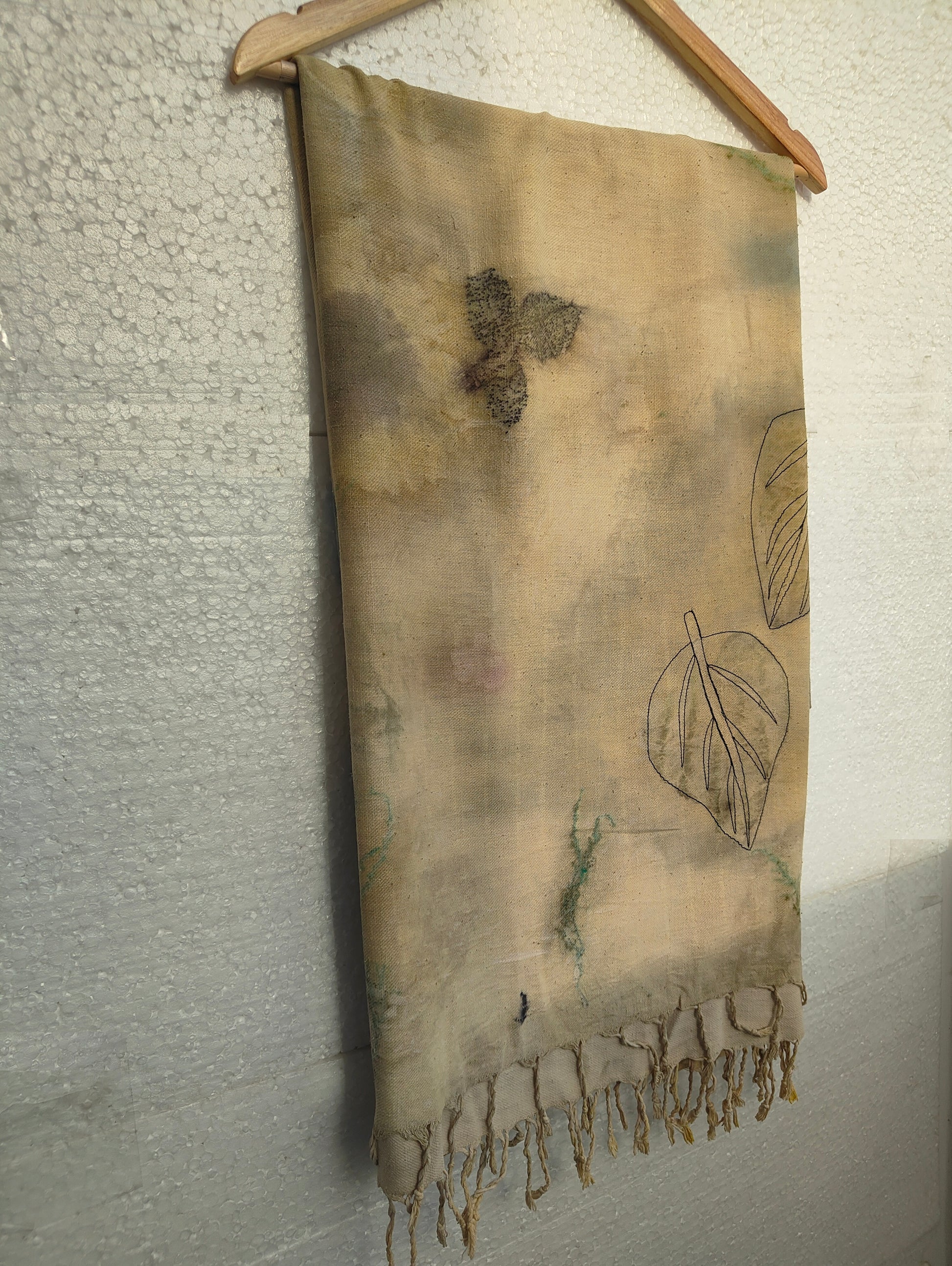A hanging Eri Silk Scarf