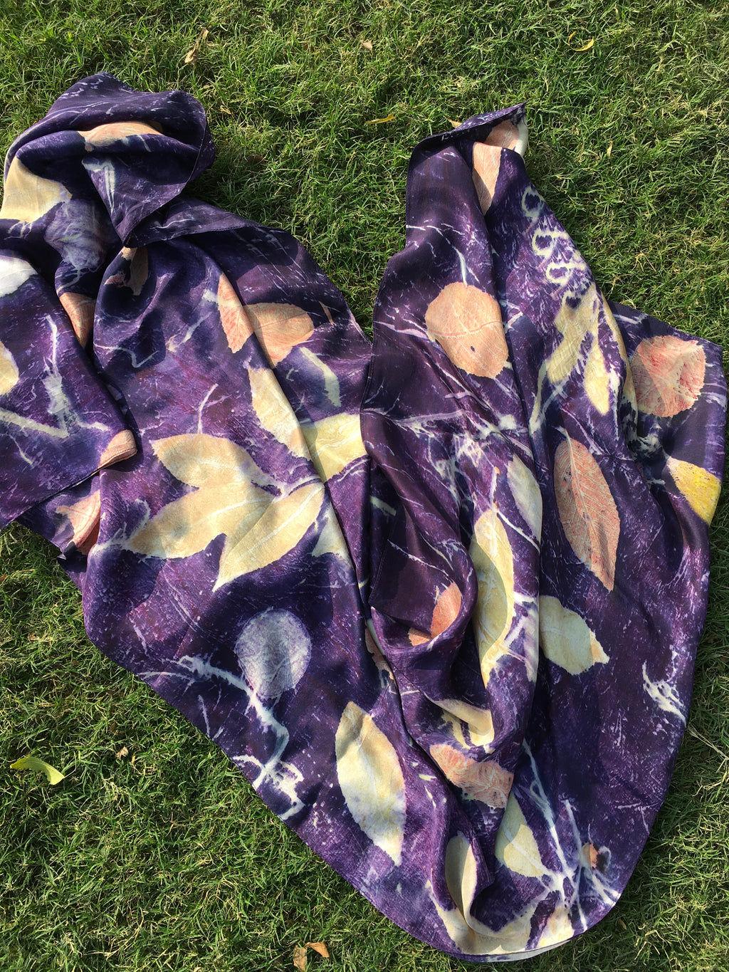 Purple logwood ecoprinted pure silk scarf on grass