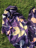 logwood ecoprinted pure silk scarf with gold patterned leaves on grass