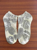 Eco printed cotton socks dyed with rose leaves and marigold flowers